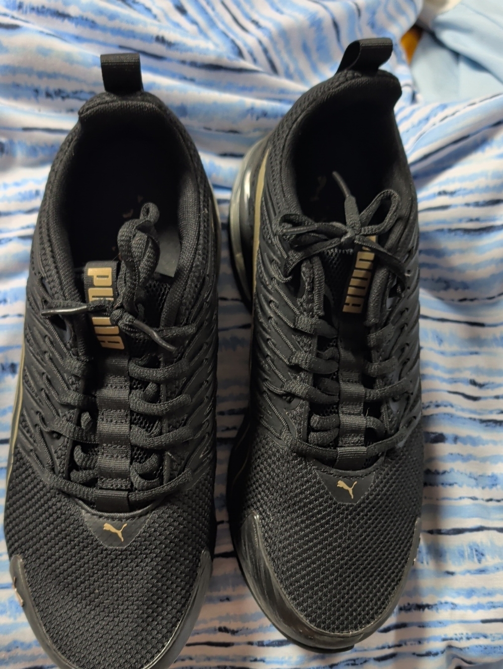 Puma Black Athletic Sneakers with Gold Logo Accents